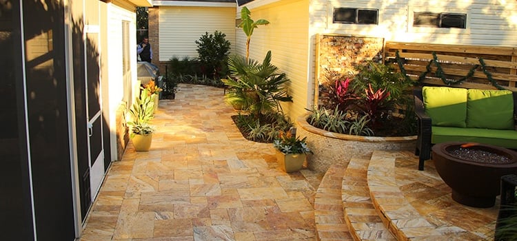 Potted plants and hardscape create a safer outdoor living area in times of high winds